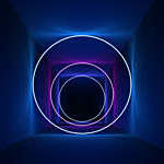 Digitally generated ring-shaped neon lights give a depth effect to a flat surface.